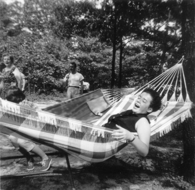 Photos courtesy of Walter Haan Seventeen-year-old Eleanor Grace Alexander of River Vale is pictured lounging merrily in a hammock in September 1957 at the summer cabin of her childhood friend Walter Haan and his family. In the background are Alexander’s mother, Gladys, left, and Walter Haan, Sr. playing a game of croquet on a field of sand and grass clumps. Ten years later, while serving as a nurse at a hospital in South Vietnam, Alexander would be killed in a plane crash. 