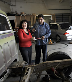 David Wilson/East Bay Monthly -- Husband-and-wife team Obdulia Loera and Martin Mijangos borrowed $10,000 from San Jose’s Opportunity Fund to jump-start their Fremont auto repair business. 